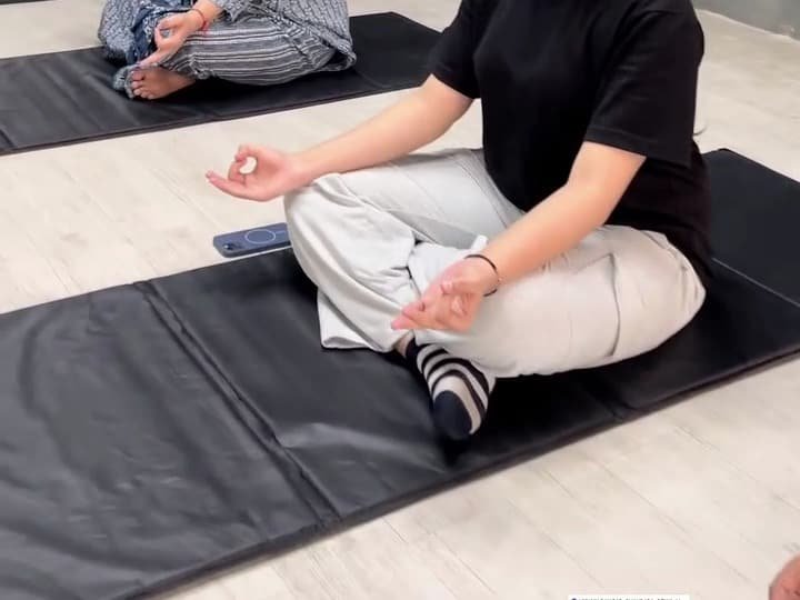 A yoga class in the group studio